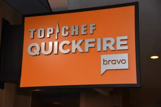 A sign reading "Top Chef QuickFile" with the Bravo lo