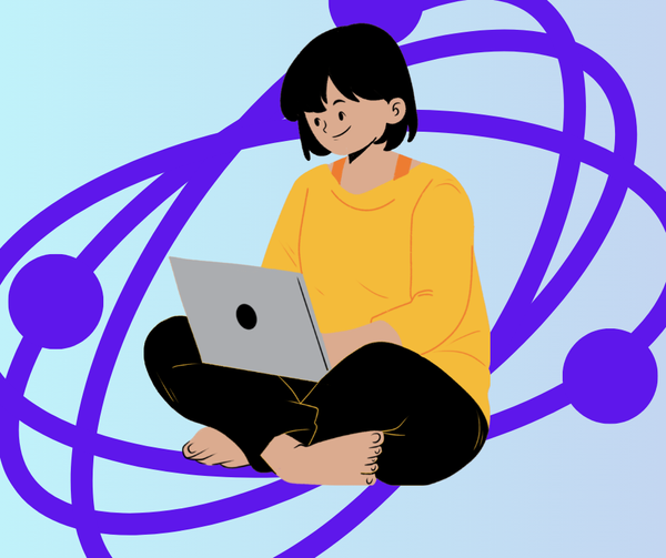 woman working on a laptop with objects orbiting around her